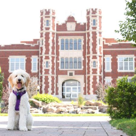 Ellie in front of Pioneer Hall